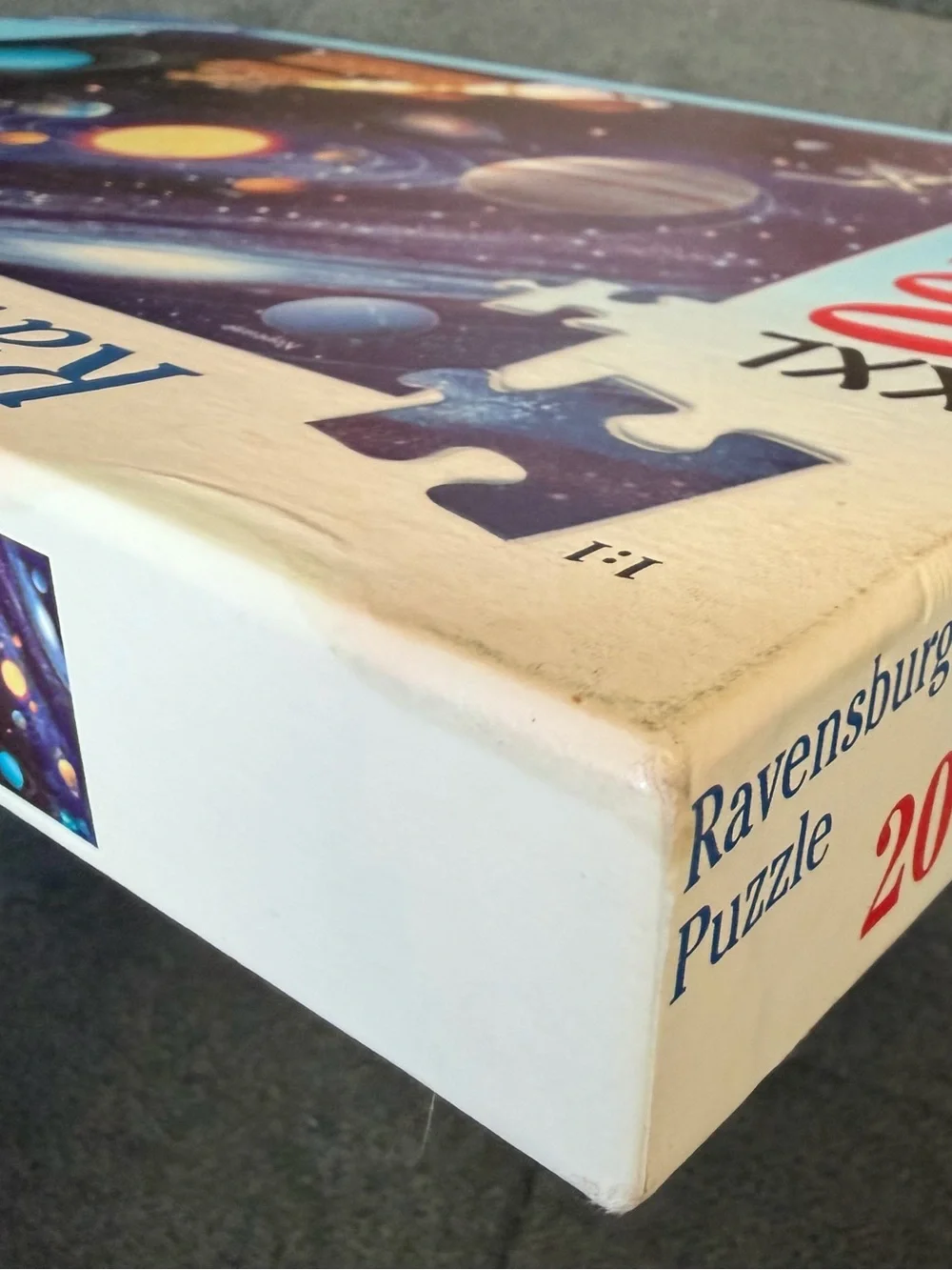 Ravensburger Space Solar System Puzzle with Purple Starfield and Yellow Sun